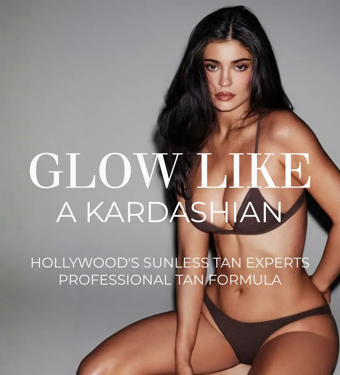 Professional model holding the Sunless by Jimmy Coco spray tan